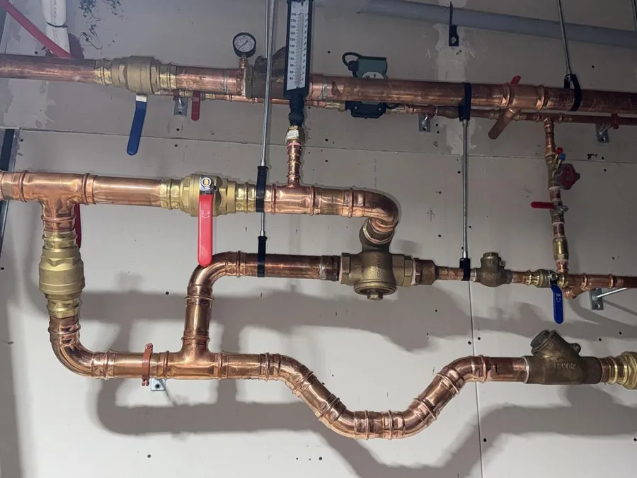 Copper supply pipework and valves installed by A1 Plumbing.
