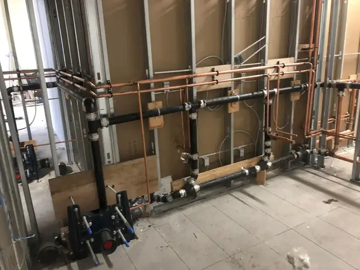 Copper supply and cast iron drainage on a commercial fit out.